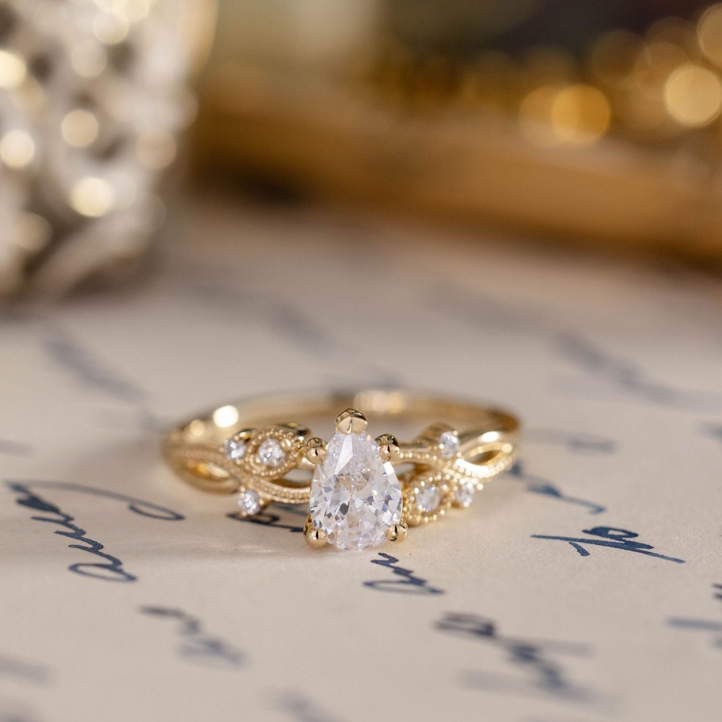 The Larkwood - Pear-Shaped Diamond Engagement Ring with Nature-Inspired Milgrain & Diamond Accents