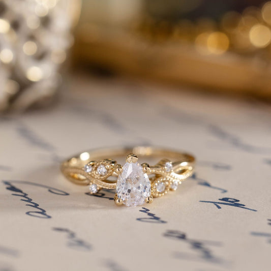 The Larkwood - Pear-Shaped Diamond Engagement Ring with Nature-Inspired Milgrain & Diamond Accents