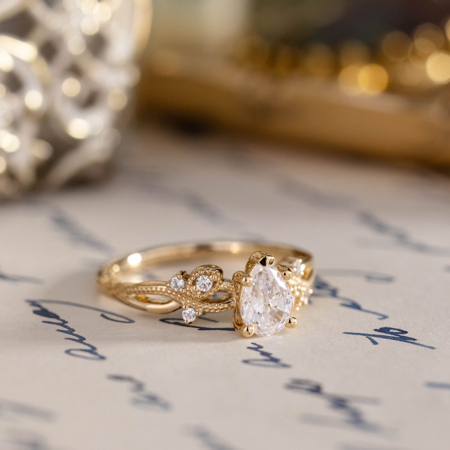 The Larkwood - Pear-Shaped Diamond Engagement Ring with Nature-Inspired Milgrain & Diamond Accents